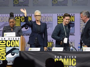 Yvette Nicole Brown, Jamie Lee Curtis, David Gordon Green, and Malek Akkad speak onstage at Universal Pictures' "Glass" and "Halloween" panels during Comic-Con International 2018 at San Diego Convention Center on July 20, 2018 in San Diego, California. (Kevin Winter/Getty Images)