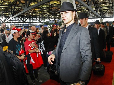 OTTAWA, ON:  MARCH 13, 2012  -- Erik Karlsson of the Ottawa Senators arrives at the train station prior to boarding the train to Montreal.  The Ottawa Senators will take part in the Operation Montreal - Heritage Train trip to Montreal. A group of 280 people, including the entire Senators team, management, partners and fans, will board a Via Rail train and travel to Montreal in advance of Ottawa's game against the Montreal Canadiens on March 14 at the Bell Centre. In honour of the trip, the team will wear its heritage uniform during the March 14 game.
