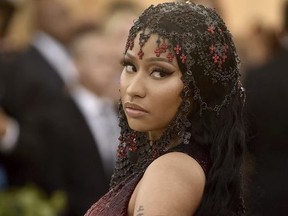 Nicki Minaj attends The Metropolitan Museum of Art's Costume Institute benefit gala celebrating the opening of the Heavenly Bodies: Fashion and the Catholic Imagination exhibition on Monday, May 7, 2018, in New York.