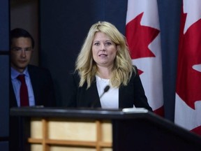 Conservative MPs Michelle Rempel, shadow Minister for Immigration, Refugees, and Citizenship, and Pierre Poilievre, shadow Minister for Finance, hold a press conference at the National Press Theatre in Ottawa on Tuesday, July 24, 2018.