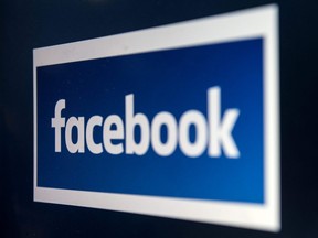 A computer screen displaying the logo of social networking site Facebook is seen in Manchester, England, on March 22, 2018.