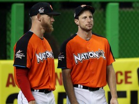 Stephen Strasburg, left, and Max Scherzer of the Washington Nationals talk during Gatorade All-Star Workout Day ahead of the 88th MLB All-Star Game at Marlins Park on July 10, 2017 in Miami, Florida. (Rob Carr/Getty Images)