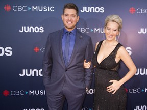 Juno host Michael Buble and his wife Luisana Lopilato attend the red carpet arrivals at the 2018 Juno Awards at Rogers Arena on March 25, 2018 in Vancouver. (Phillip Chin/Getty Images)