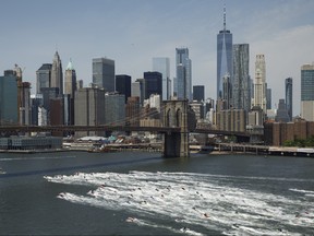 Jet skiers ride in the East River, June 9, 2018 in New York City. (Drew Angerer/Getty Images)