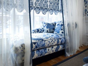 After: Reupholstered in punchy blue and white fabric, the chaise now takes centre stage in this bedroom window.