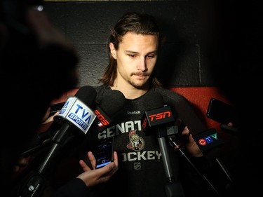 Erik Karlsson of the Ottawa Senators talks about the passing of assistant coach Mark Reeds at the Canadian Tire Centre in Ottawa, April 14, 2015.