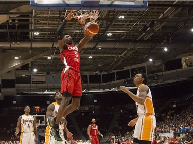 It's two more points for Canada's R.J. Barrett (5) after this first-quarter dunk. Errol McGihon/Postmedia
