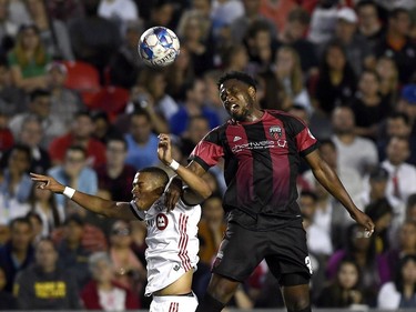 Ottawa Fury FC's Eddie Edward (3) heads the ball against Toronto FC's Ryan Telfer (54) during second half Canadian Championship soccer action in Ottawa on Wednesday, July 18, 2018.