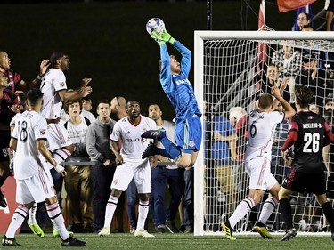 Toronto FC goalkeeper Clint Irwin (1) makes a save against the Ottawa Fury FC during second half Canadian Championship soccer action in Ottawa on Wednesday, July 18, 2018.