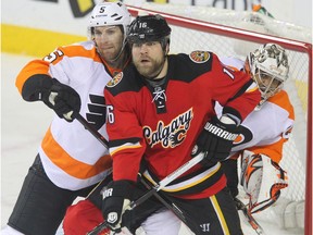 Forward Brian McGrattan, middle, and goalie Ray Emery, right, were good friends during their time together with the Ottawa Senators. McGrattan mourned Emery on Twitter on Sunday. Jim Wells/Postmedia