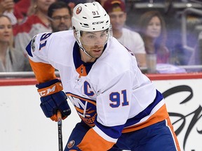In this Nov. 2, 2017, file photo, New York Islanders centre John Tavares skates with the puck during the second period of an NHL hockey game against the Washington Capitals, in Washington.