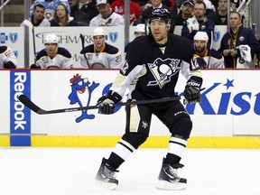 Jarome Iginla dresses for the Pittsburgh Penguins on April 2, 2013, just days after he was traded from Calgary.