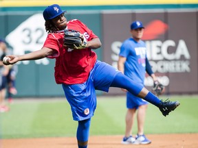 Vladimir Guerrero Jr. throws a baseball during practice ahead of his triple-A debut versus the Lehigh Valley IronPigs in Buffalo. THE CANADIAN PRESS