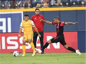 Tony Taylor, right, of Fury FC tries to kick the ball away from Taylor Washington of Nashville SC during the first half of Friday's contest.  Nashville SC photo.