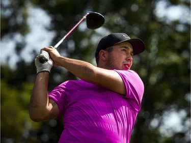 Jaeger Prot hits a tee shot during men's B Division play Saturday at The Marshes.   Ashley Fraser/Postmedia