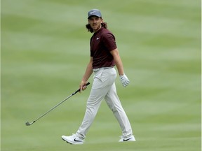 Tommy Fleetwood walks across the sixth hole during Friday's second round of the World Golf Championships-Bridgestone Invitational.