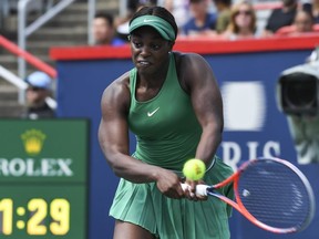 Sloane Stephens prepares to hit a return against Carla Suarez Navarro of Spain during day four of the Rogers Cup at IGA Stadium on August 9, 2018 in Montreal, Quebec, Canada.