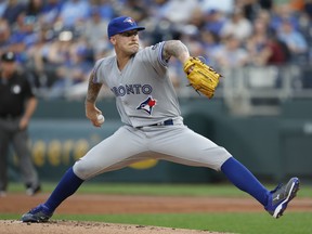 Making is major league debut, Blue Jays pitcher Sean Reid-Foley throws to a Kansas City Royals batter during Monday's game. (AP PHOTO)