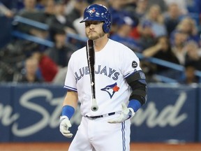 Josh Donaldson of the Toronto Blue Jays reacts after striking out in the ninth inning during MLB game action against the New York Yankees at Rogers Centre on March 30, 2018 in Toronto.