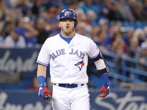 Josh Donaldson of the Toronto Blue Jays reacts after fouling a ball off his leg in the first inning during MLB game action against the Boston Red Sox at Rogers Centre on May 12, 2018 in Toronto. (Tom Szczerbowski/Getty Images)