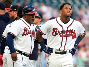 Ronald Acuna Jr. of the Atlanta Braves reacts to being hit by the first pitch of the game against the Miami Marlins at SunTrust Park on August 15, 2018 in Atlanta. (Daniel Shirey/Getty Images)