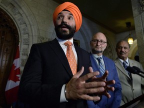 Minister of Innovation, Science and Economic Development Navdeep Bains makes an announcement in the Foyer of the House of Commons on Parliament Hill in Ottawa on Tuesday, June 19, 2018.