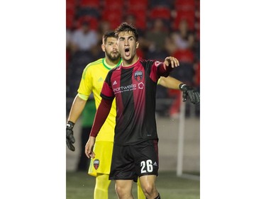 Fury FC's Thomas Meilleur-Giguère (26) shouts to teammates during a pause in play during Friday's match against the Rowdies at TD Place stadium. Steve Kingsman/Freestyle Photography for Ottawa Fury FC