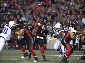Redblacks quarterback Trevor Harris (7) throws a during the first half of the Aug. 11 game against the Alouettes at TD Place stadium. The Redblacks won that contest 24-17 on a late touchdown by William Powell.