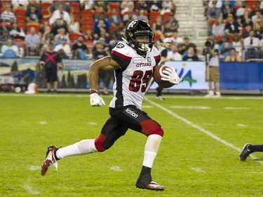Ottawa Redblacks wide receiver Diontae Spencer (85) runs in a touchdown during third quarter CFL action against the Argonauts Toronto in Toronto on Thursday, August, 2, 2018.