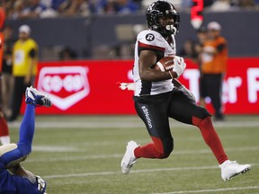 Ottawa Redblacks' William Powell (29) runs the ball in for the touchdown against the Winnipeg Blue Bombers during the second half of CFL action in Winnipeg Friday, August 17, 2018.