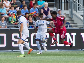 Ottawa Fury’s Eddie Edward takes on two Penn FC players at TD Place Stadium. Steve Kingsman/Freestyle Photography/Ottawa Fury FC