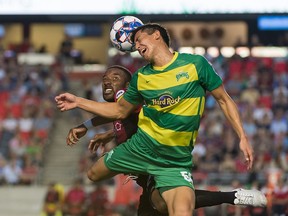 Ottawa Fury’s Jamar Dixon (left) contests a high ball with ampa Bay Rowdies’ Stefano Bonomo during their match last night at TD Place. Steve Kingsman/Freestyle Photography