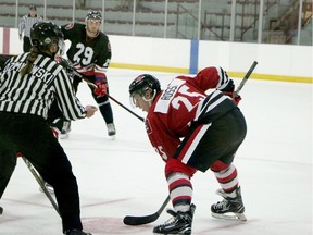 Forward Marco Rossi takes a faceoff during a 67's training-camp intrasquad game Wednesday. Jacob Kelly/Ottawa 67's photo