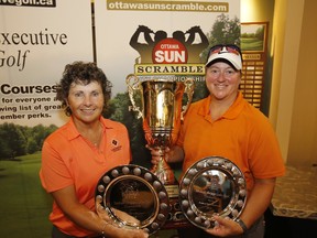 Lise Jubinville (right) and Brenda Pilon won the Yakabuski Ladies Open at the Ottawa Sun Scramble at the Eagle Creek golf course on Sunday. (Patrick Doyle/Postmedia)