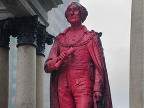 The statue of Sir John A. Macdonald is seen after being vandalized in Montreal on Friday, Aug. 17 2018.