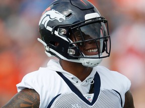 Denver Broncos linebacker Brandon Marshall takes part in drills during the team's NFL football training camp Saturday, July 28, 2018, in Englewood, Colo.