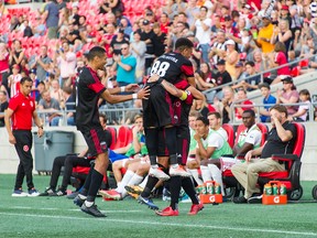 Ottawa Fury FC players celebrate a goal against the Richmond Kickers at TD Place Stadium on Wednesday. (Steve Kingsman/Freestyle Photography )