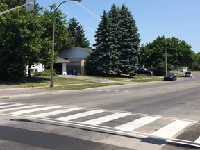 The fines can be levied if a driver is seen failing to stop at a crosswalk, or obstructing a crosswalk by stopping inside its boundaries. File photo