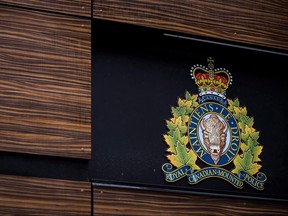 The RCMP logo is seen outside Royal Canadian Mounted Police "E" Division Headquarters, in Surrey, B.C., on April 13, 2018.