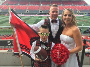Redblacks fans Rob Nadeau and Sam Mulvihill got married on Friday night at TD Place before the Ottawa-Montreal game. Mulvihill’s son Cale was among the 125 guests who gathered in the Subaru Log Cabin for the special occasion. (TIM BAINES/POSTMEDIA NETWORK)