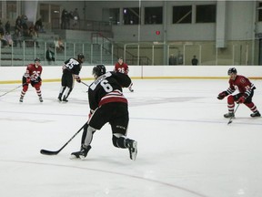 Defenceman Merrick Rippon (6) makes a pass during the 67's training camp intrasquad game at the Minto Sports Complex arena on the University of Ottawa campus on Wednesday. Jacob Taylor/Ottawa 67's photo