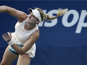 Eugenie Bouchard serves to Harmony Tan during their first-round match at the U.S. Open in New York on Tuesday.