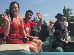 Tessa Virtue and Scott Moir cruise through a Saturday parade that kicked off the Thank You Ilderton bash in the town that's at the heart of their success. (Ryan Pyette/The London Free Press)