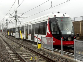 One of Ottawa's new LRT cars in the unfinished Tremblay station.