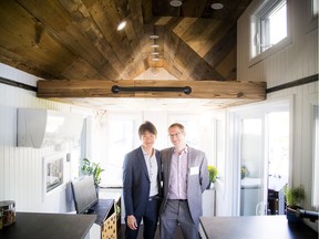 Seungyeon Hong, a master's student in civil engineering, and professor Scott Bucking pose inside the Northern Nomad on Saturday.