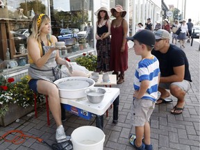 Evelyn Thain of Hintonburg Pottery demonstrates pottery at the Taste of Wellington West event in Ottawa on Saturday, Sept. 15, 2018.