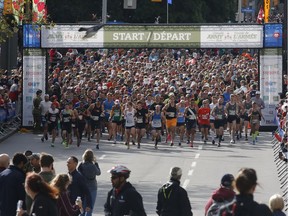 Runners leave the start of the half marathon at the Army Run in Ottawa on Sunday, September 23, 2018.