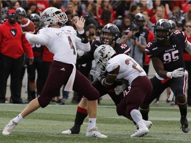 University of Ottawa Gee-Gees quarterback Sawyer Buettner launches a pass.