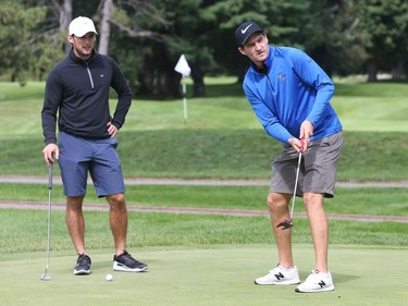 Mark Stone and Chris Wideman (L) of the Ottawa Senators practise their putting strokes at the Royal Ottawa Golf Club for the annual Bell/Ottawa Senators Charity Golf Classic presented by Ferguslea Properties Limited, September 12, 2018.