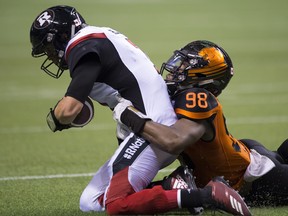 Ottawa Redblacks quarterback Trevor Harris took six sacks during Friday's game. (THE CANADIAN PRESS)